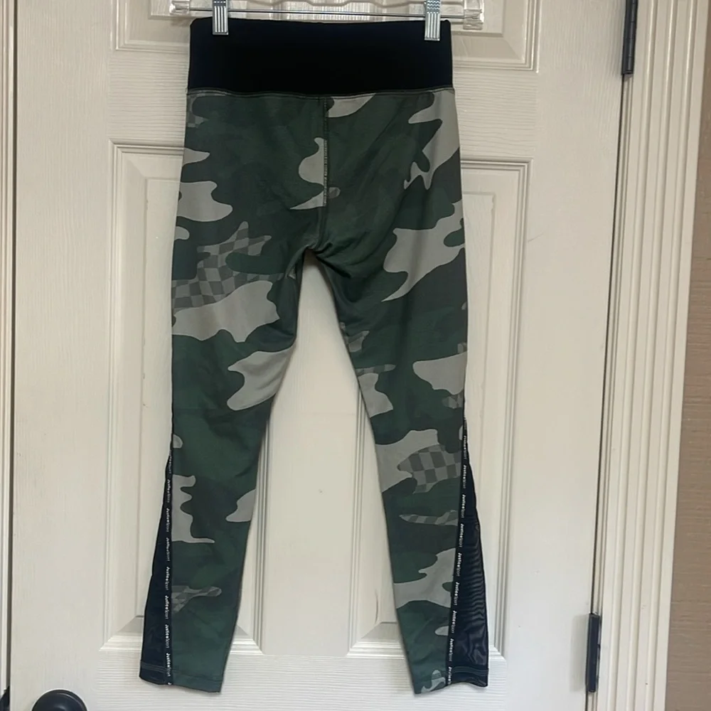 Justice sport leggings. Size large (12-14). Camo. Mesh on the lower leg.